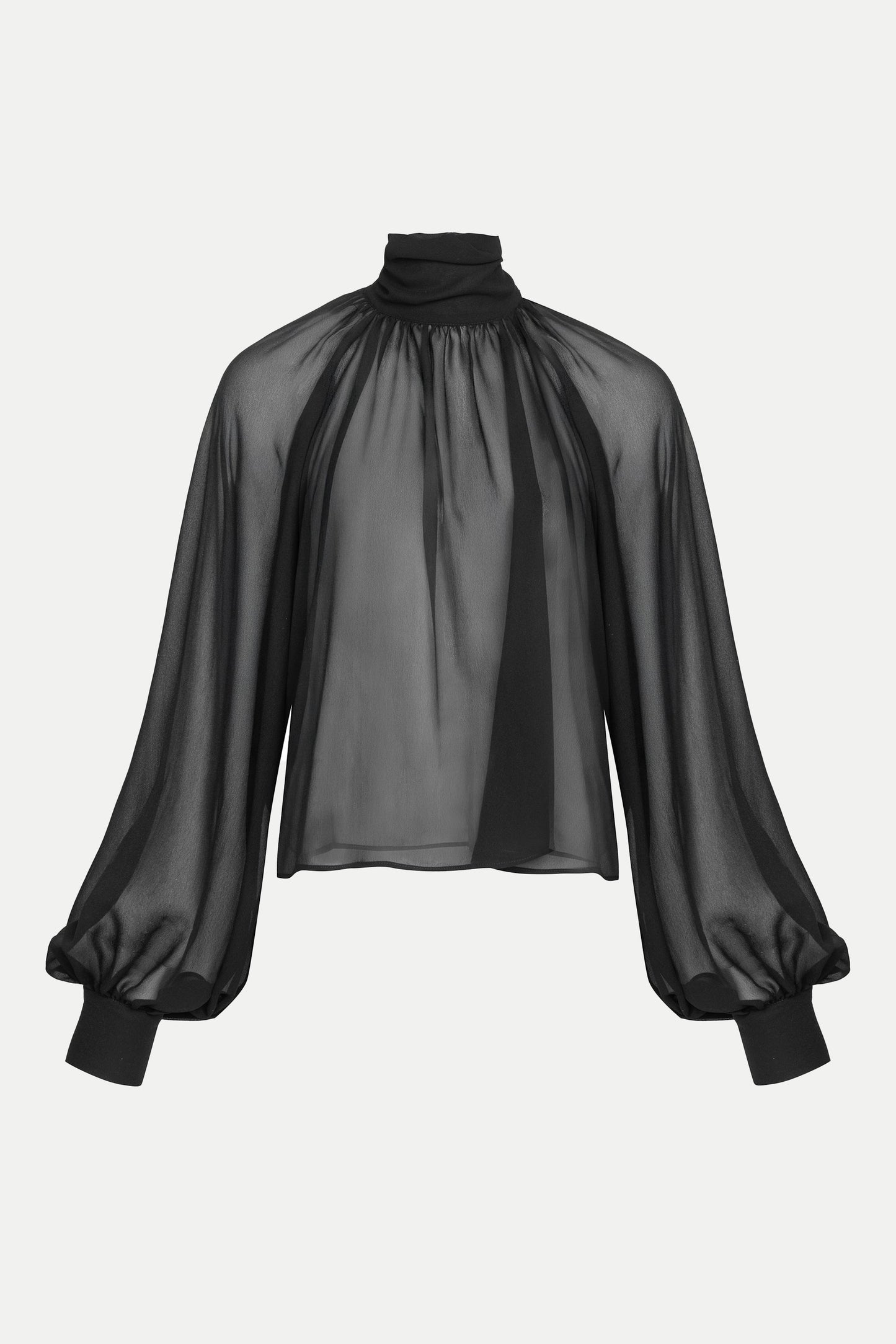 Black sheer 100% silk blouse with high neckline, long balloon sleeves, and pearl accents on cuffs and back fastening.